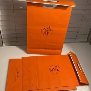 Set of three 100% authentic Hermes shopping bags